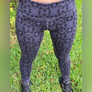 EUC Lululemon Size 4 Leggings with Purple and Black Design